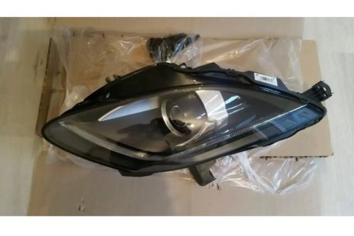 Headlight right chrome bezel NEW T2R12512